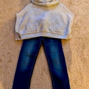 Toddler girl shawl sweater and ballerina jeans.